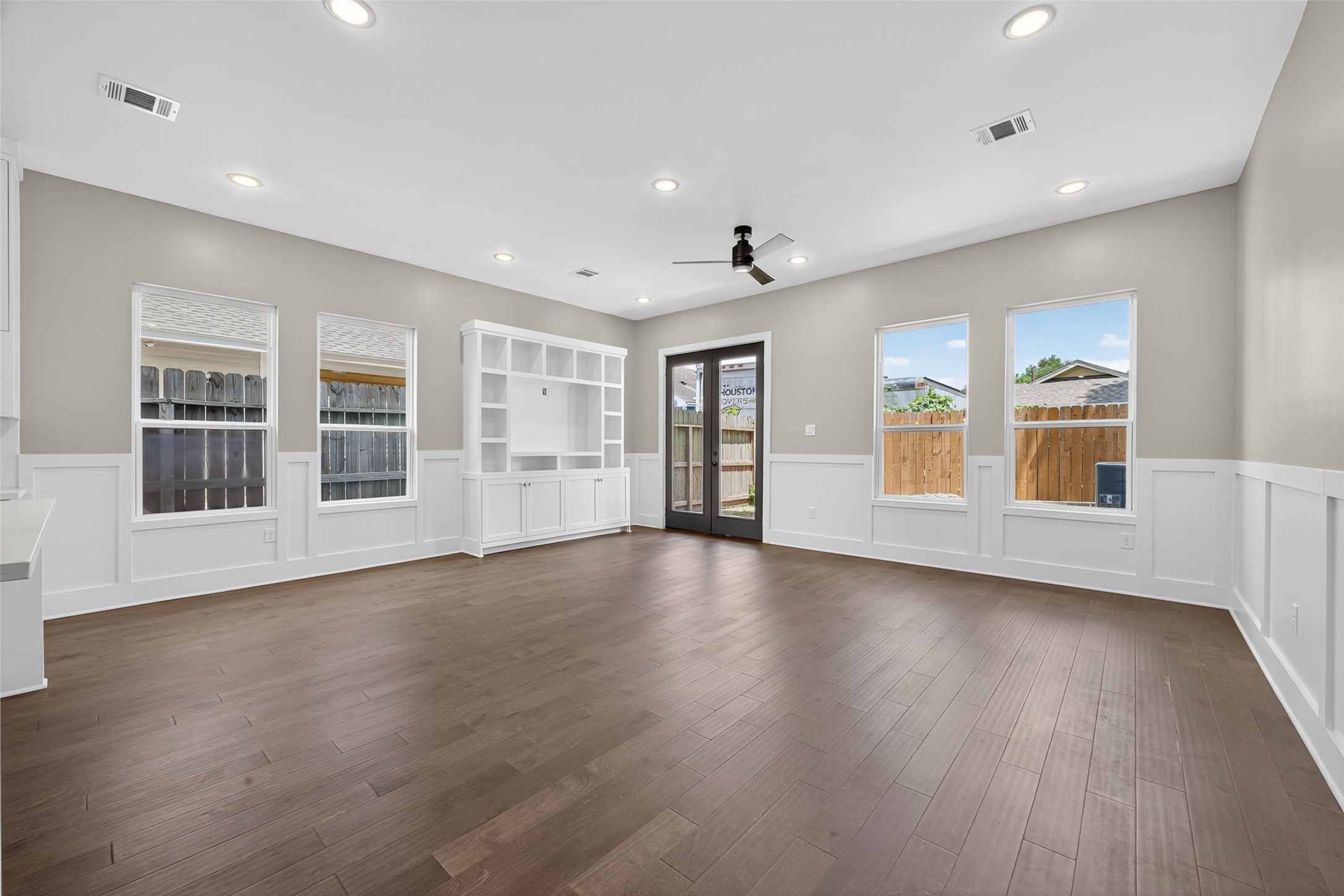 7325 Market Street Houston, TX 77020 - Photo 13 of 47 a view of an empty room with a window and wooden floor