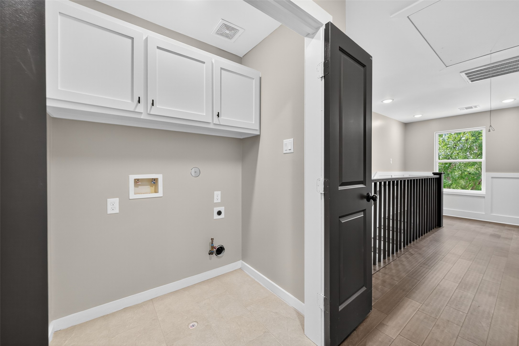 7325 Market Street Houston, TX 77020 - Photo 27 of 47 a view of a kitchen with wooden cabinets