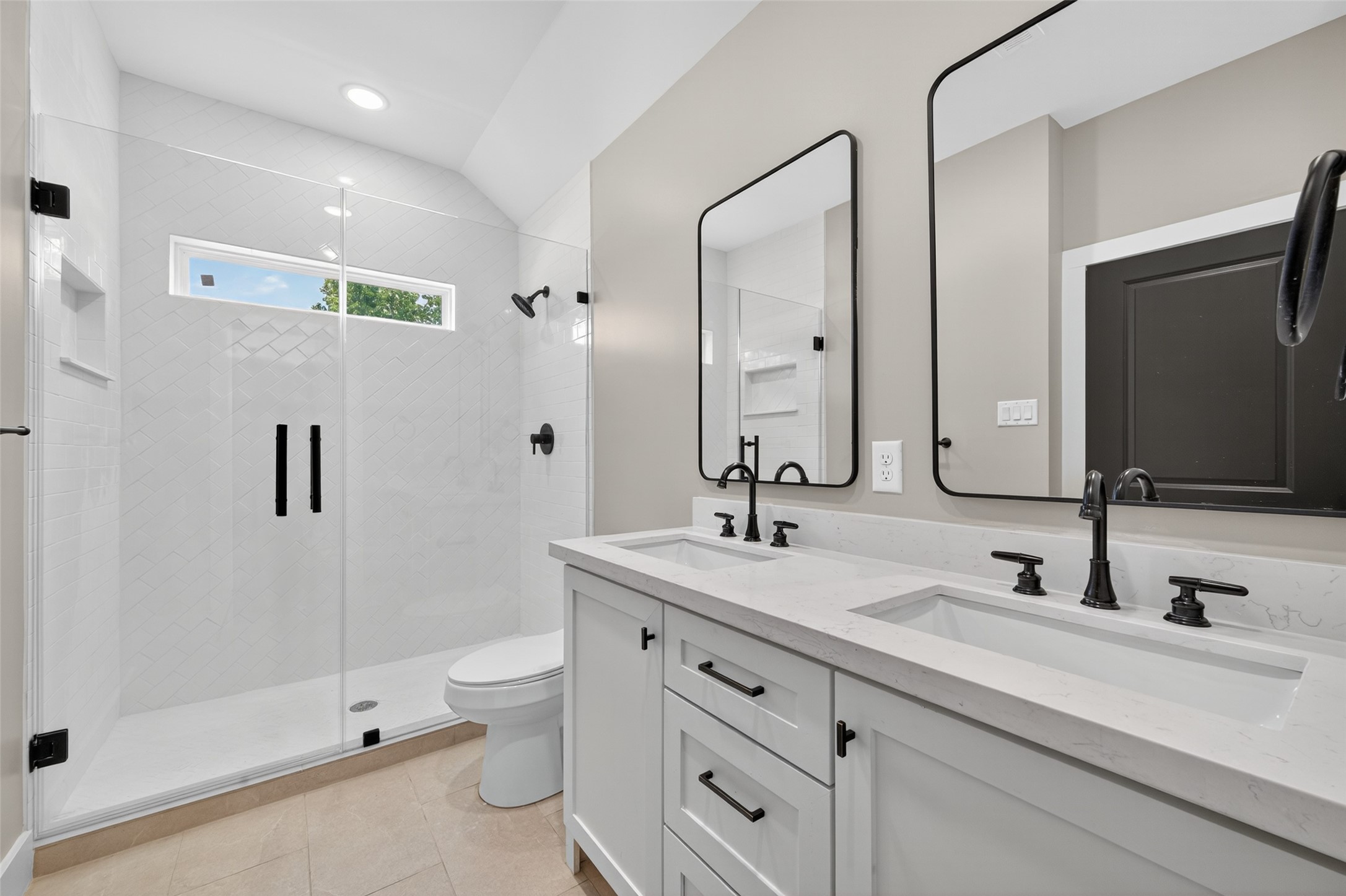 7325 Market Street Houston, TX 77020 - Photo 32 of 47 a bathroom with a double vanity sink mirror and toilet