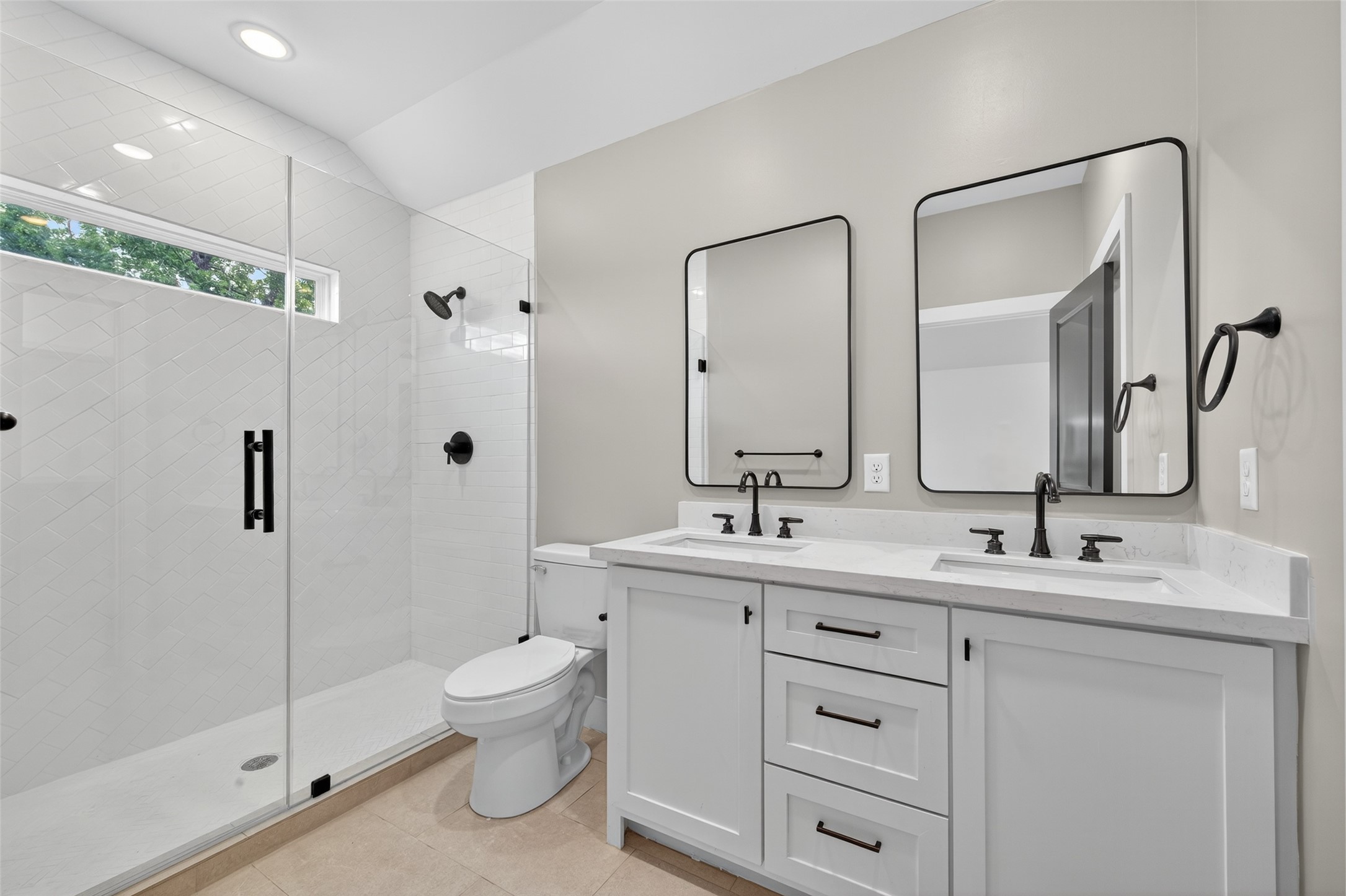 7325 Market Street Houston, TX 77020 - Photo 33 of 47 a bathroom with a double vanity sink toilet and shower