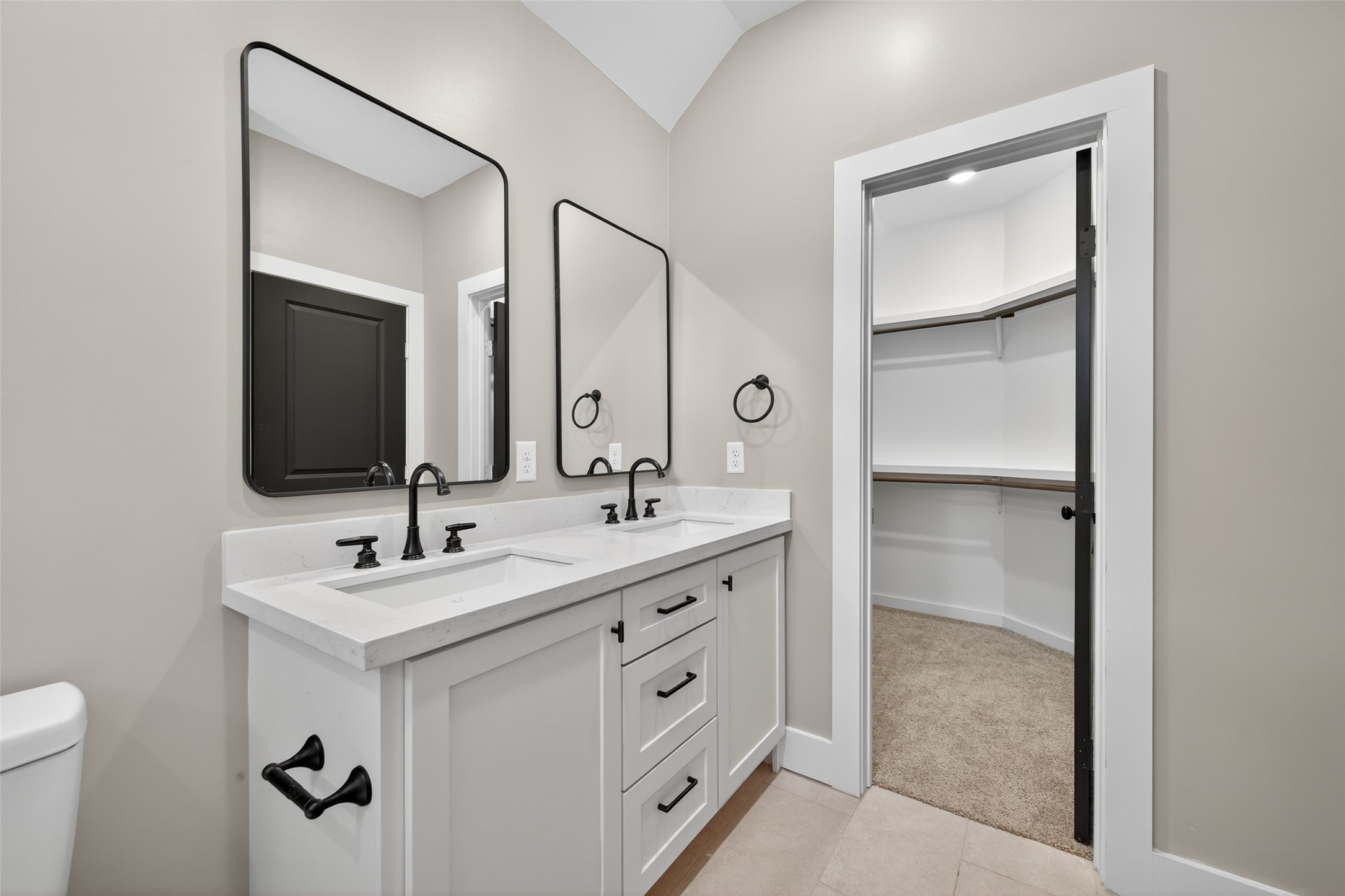 7325 Market Street Houston, TX 77020 - Photo 34 of 47 a bathroom with a double vanity sink and mirror