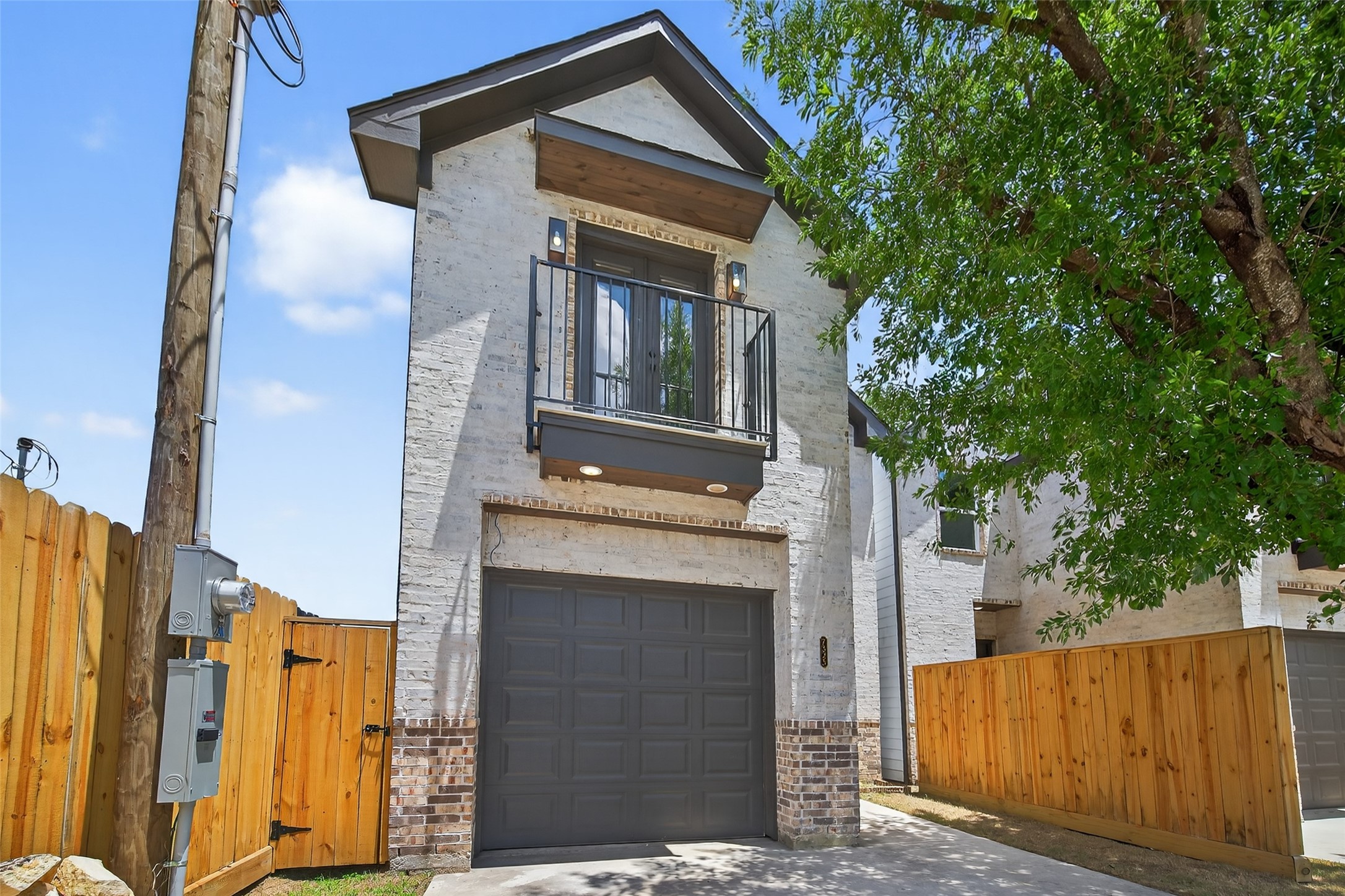 7325 Market Street Houston, TX 77020 - Photo 40 of 47 a front view of a house with a tree