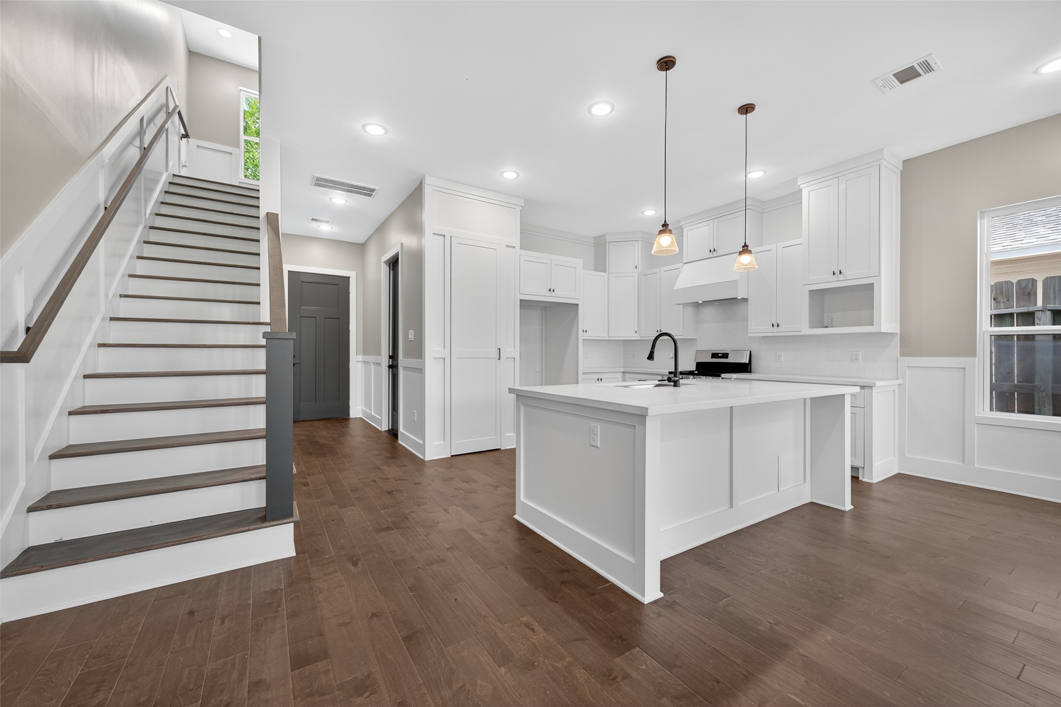 7325 Market Street Houston, TX 77020 - Photo 43 of 47 a view of kitchen with white cabinets and stainless steel appliances