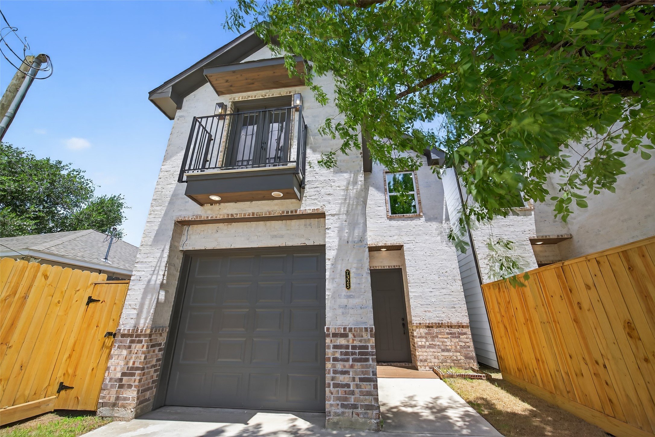7325 Market Street Houston, TX 77020 - Photo 45 of 47 a front view of a house with a tree