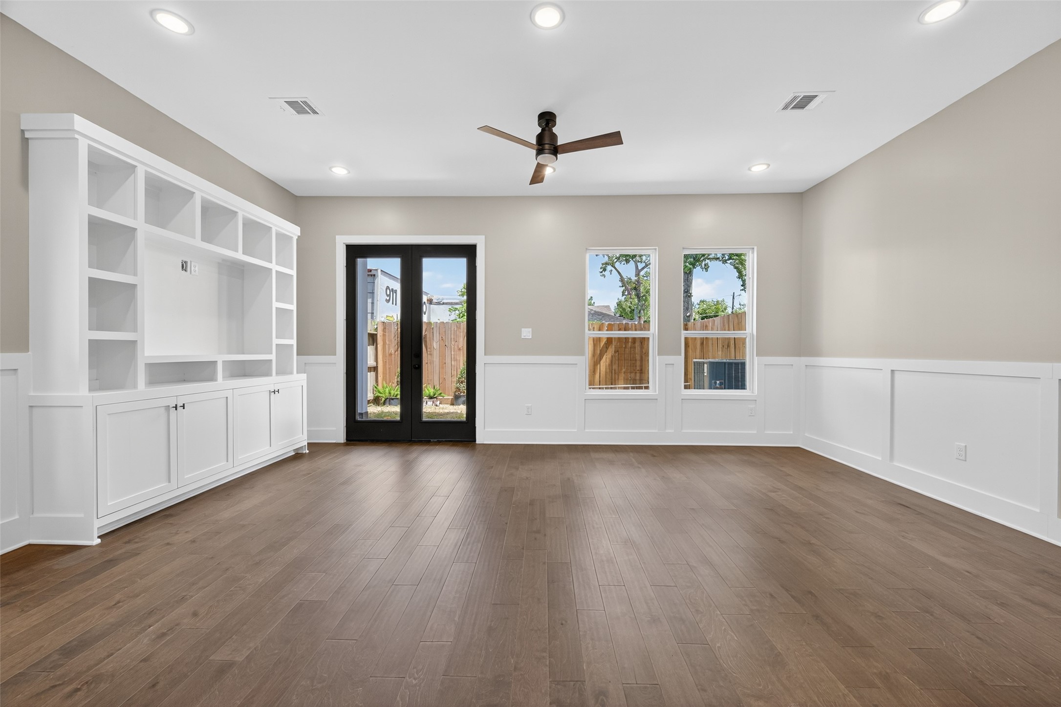 7325 Market Street Houston, TX 77020 - Photo 47 of 47 a view of an empty room with window and wooden floor