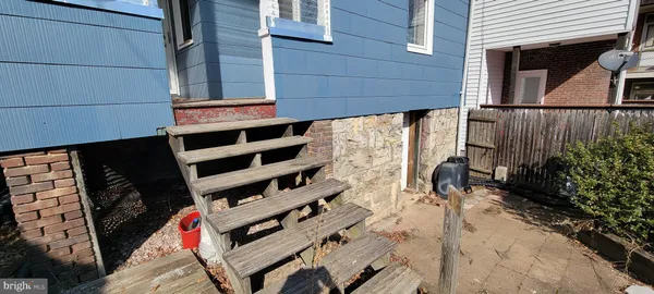 a view of an outdoor space with wooden deck