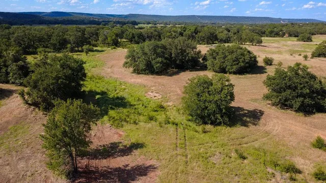 a view of a lake with a mountain in the background
