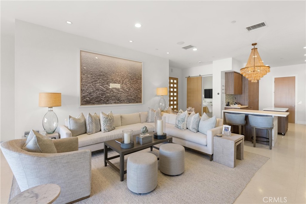 3306 Marcus Avenue Newport Beach, CA 92663 - Photo 11 of 36 a living room with furniture and a painting