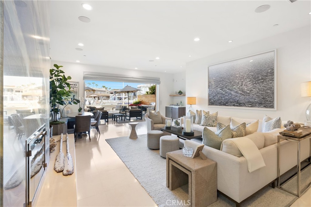 3306 Marcus Avenue Newport Beach, CA 92663 - Photo 2 of 36 a living room with furniture and a painting