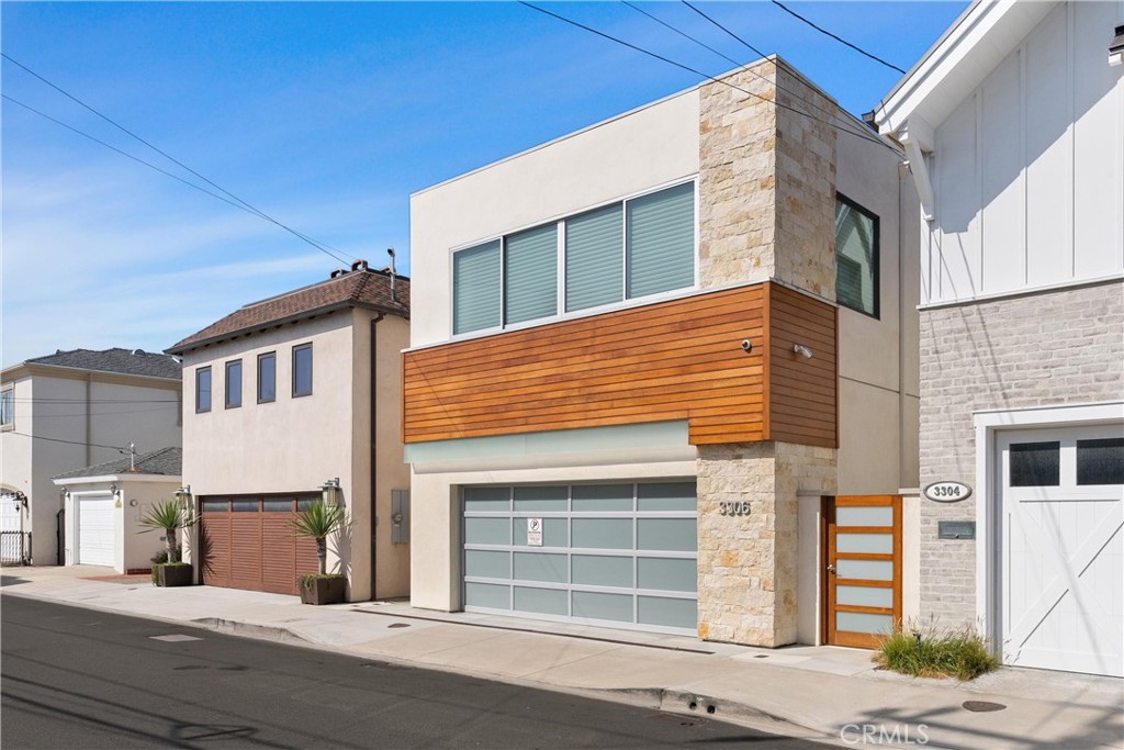 3306 Marcus Avenue Newport Beach, CA 92663 - Photo 33 of 36 a front view of a house with a yard