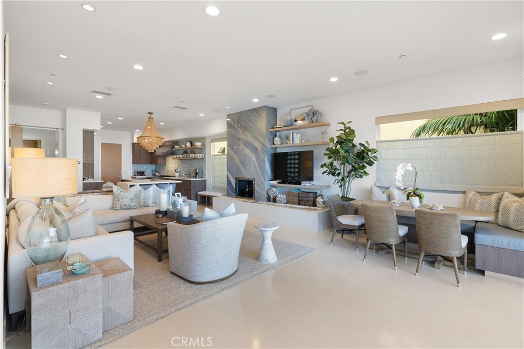 3306 Marcus Avenue Newport Beach, CA 92663 - Photo 7 of 36 a living room with furniture and a large window