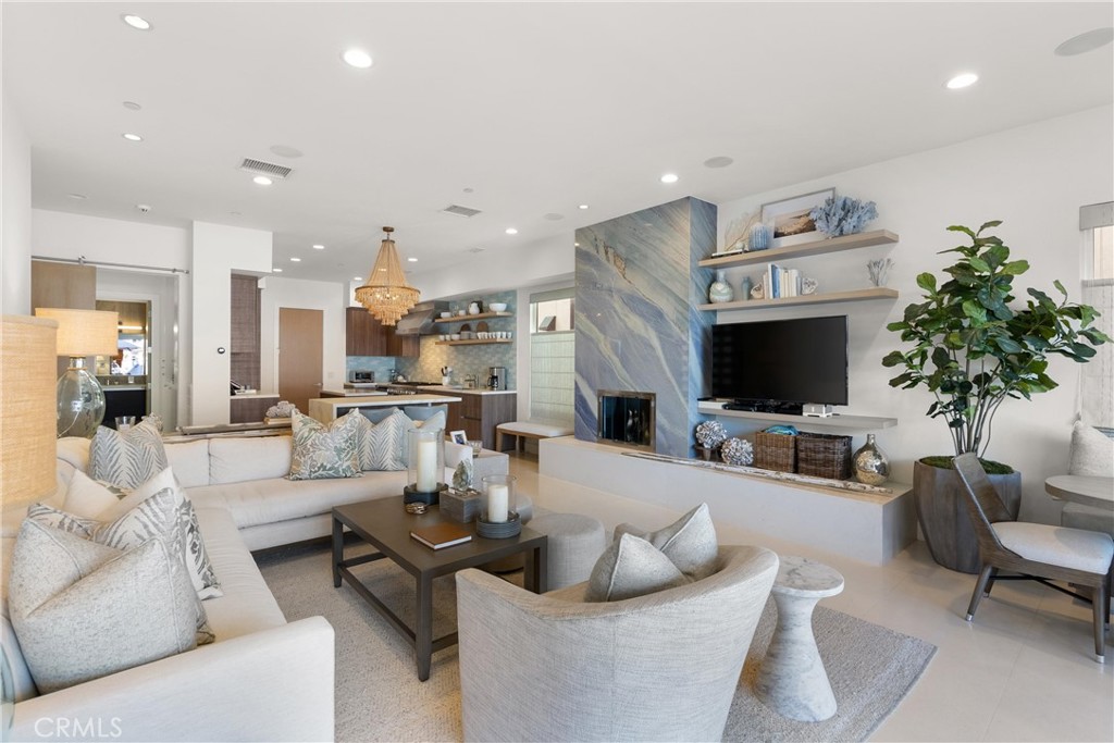 3306 Marcus Avenue Newport Beach, CA 92663 - Photo 10 of 36 a living room with furniture and a flat screen tv