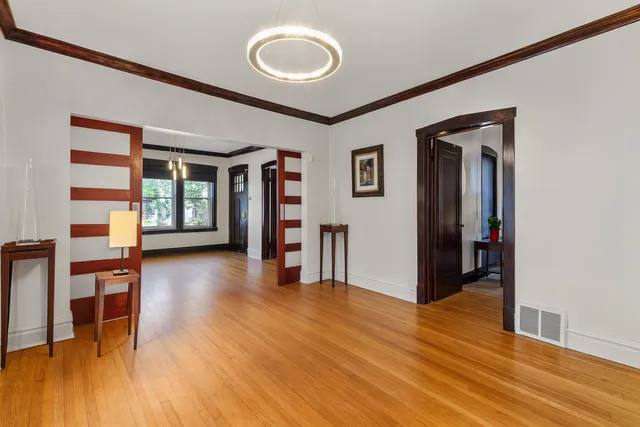 a view of a livingroom with furniture and wooden floor