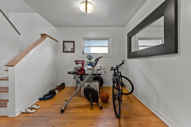 a very nice looking room with wooden floor