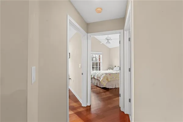 a view of a bedroom from a hallway