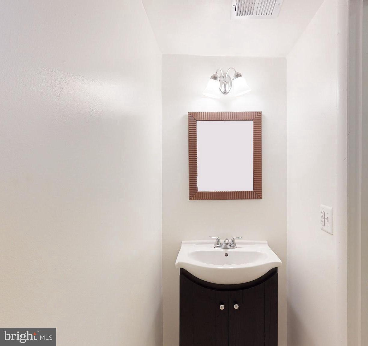 2384 Generation Drive Reston, VA 20191 - Photo 22 of 26 Basement level half bathroom