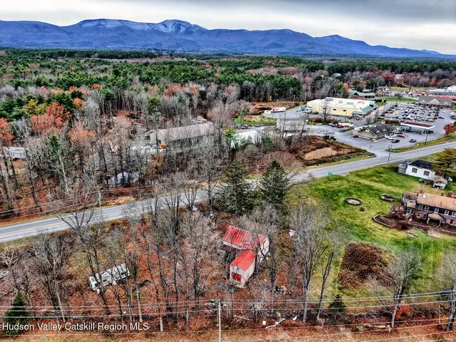 a sign that is sitting in a garden