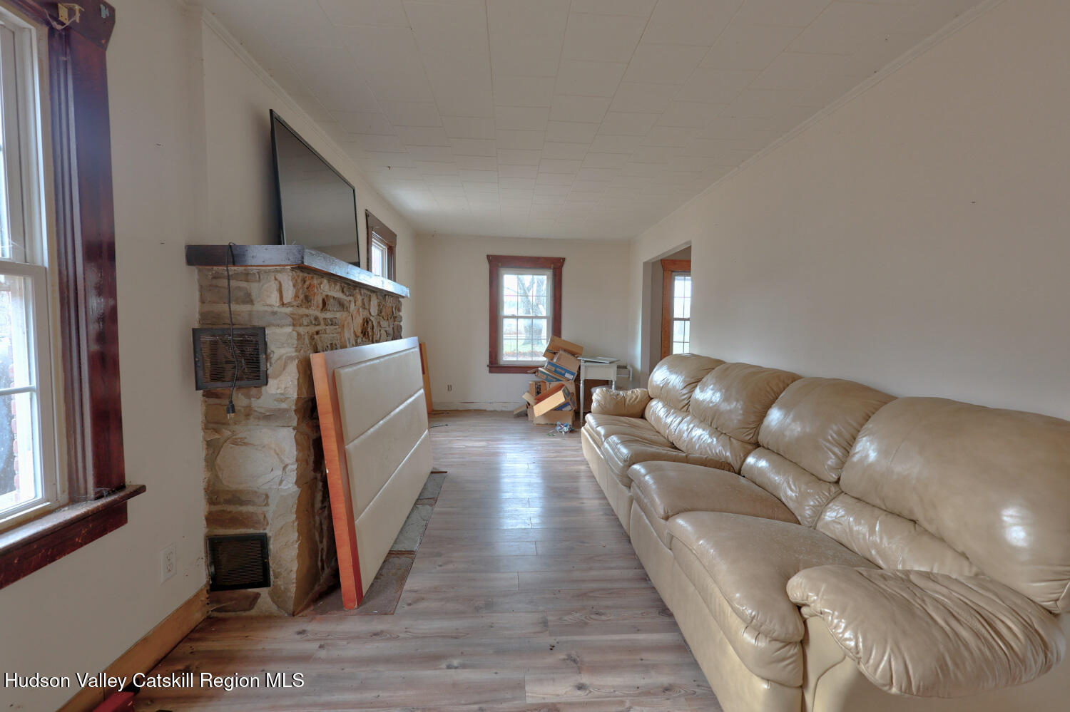 7548 Highway 32 Cairo, NY 12413 - Photo 18 of 50 a living room with furniture and a wooden floor