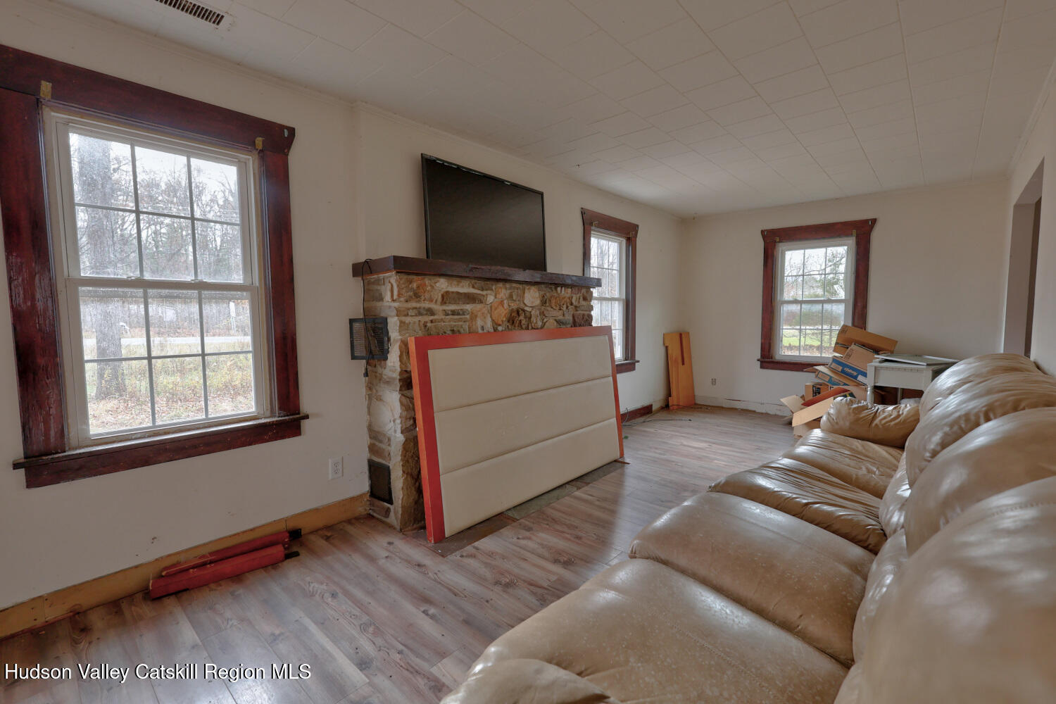 7548 Highway 32 Cairo, NY 12413 - Photo 19 of 50 a living room with furniture and a flat screen tv