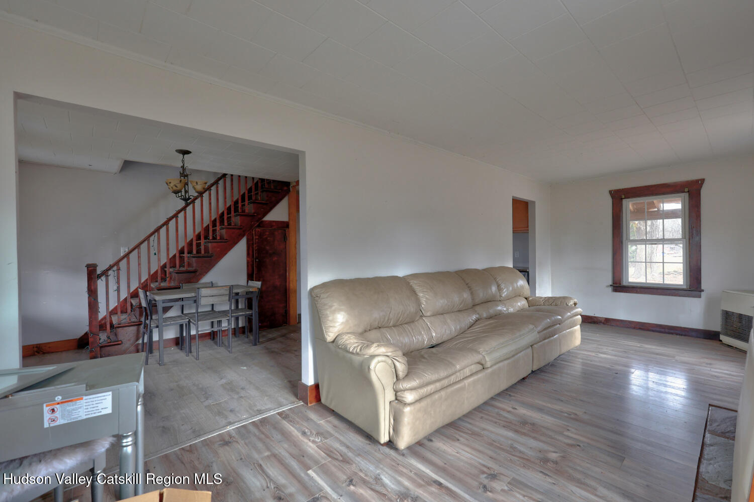 7548 Highway 32 Cairo, NY 12413 - Photo 21 of 50 a living room with furniture and stairs