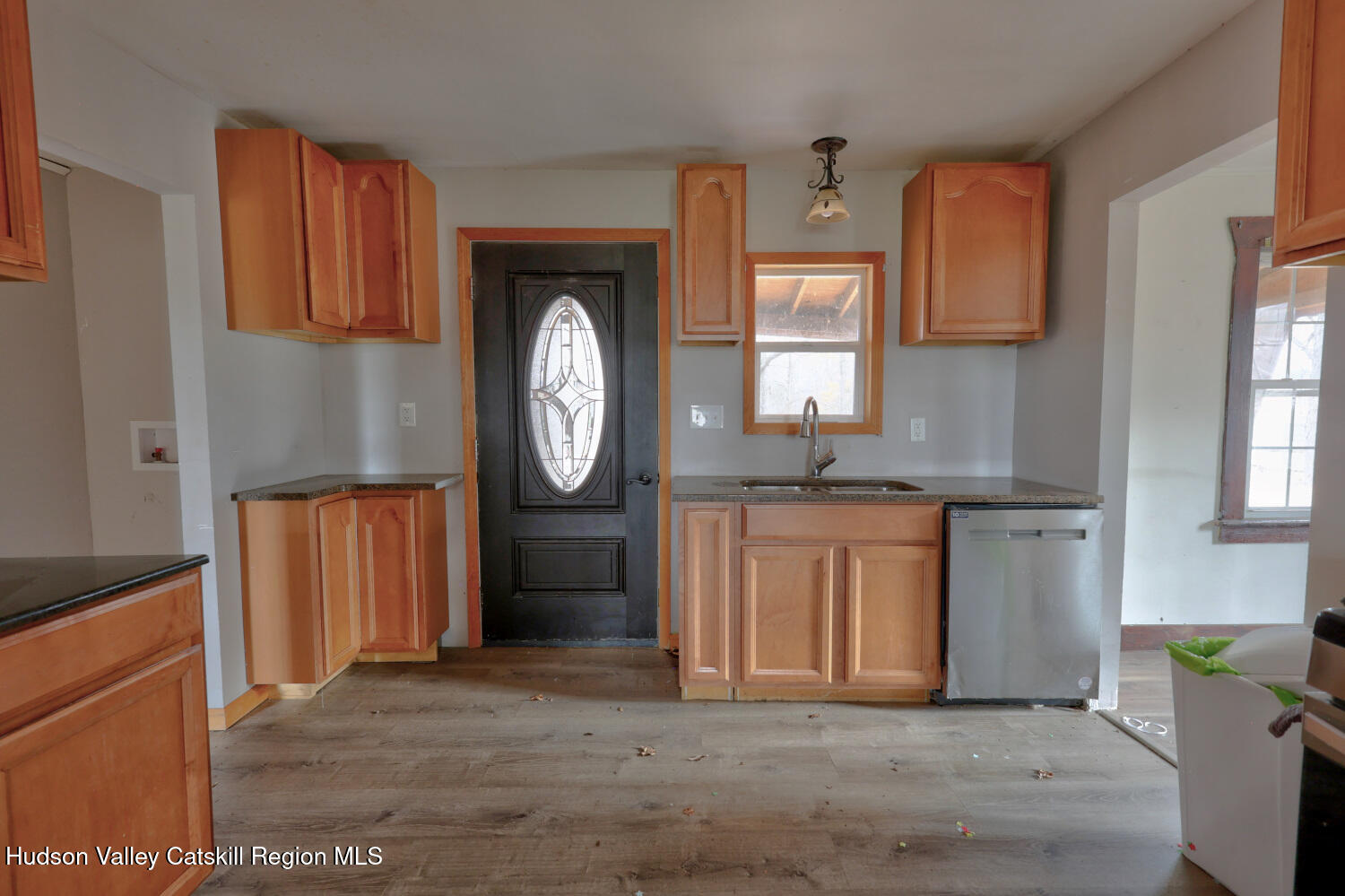 7548 Highway 32 Cairo, NY 12413 - Photo 24 of 50 a hallway with granite countertop a sink a stove a window and a refrigerator