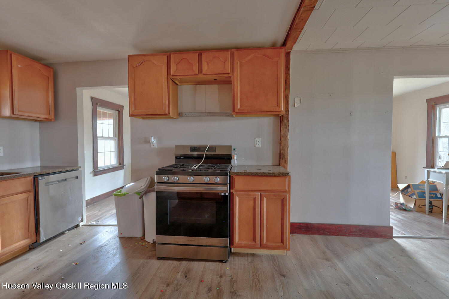 7548 Highway 32 Cairo, NY 12413 - Photo 25 of 50 a kitchen with stainless steel appliances granite countertop a stove a microwave and a refrigerator