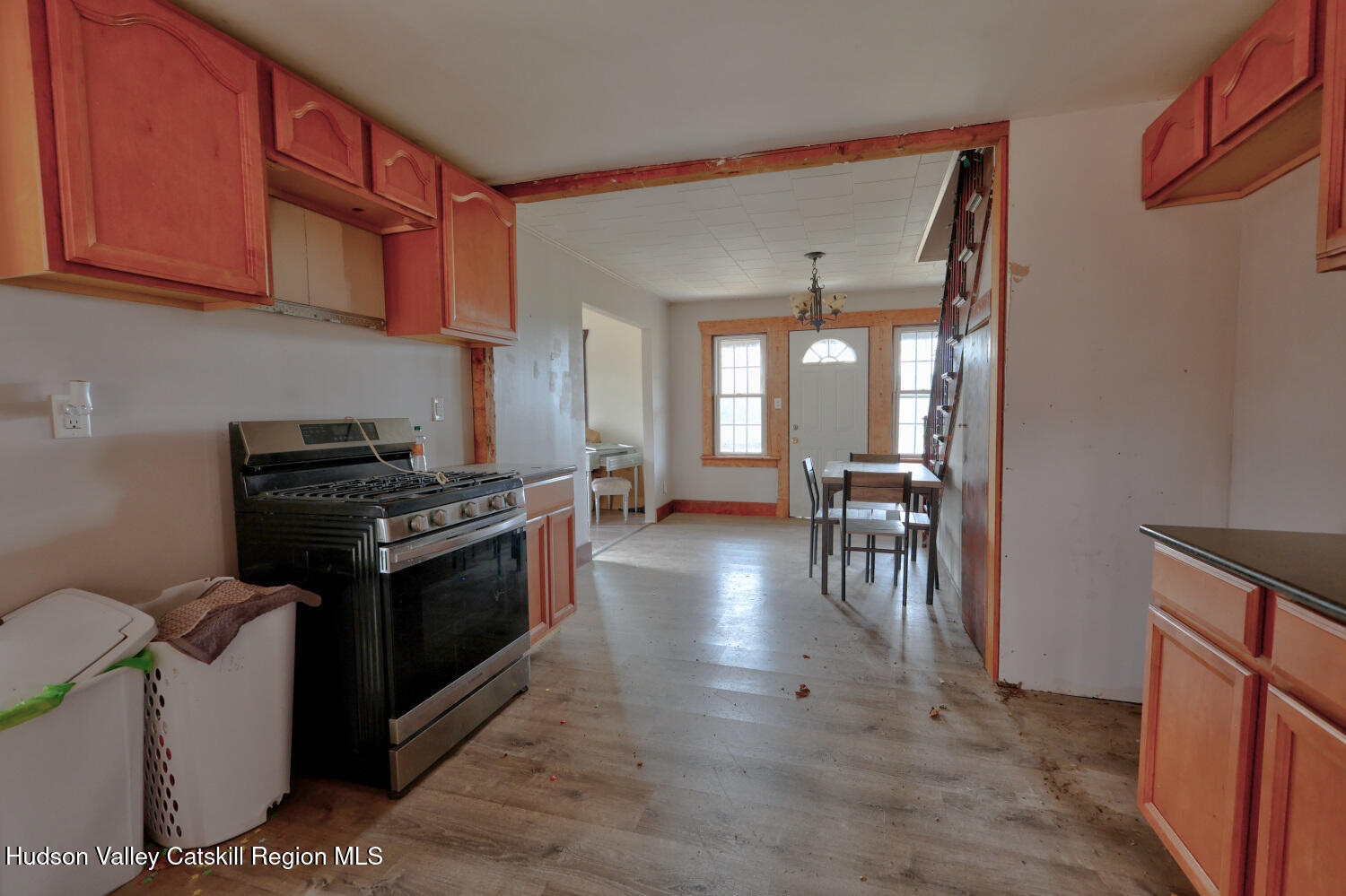 7548 Highway 32 Cairo, NY 12413 - Photo 26 of 50 a kitchen with granite countertop a stove and cabinets