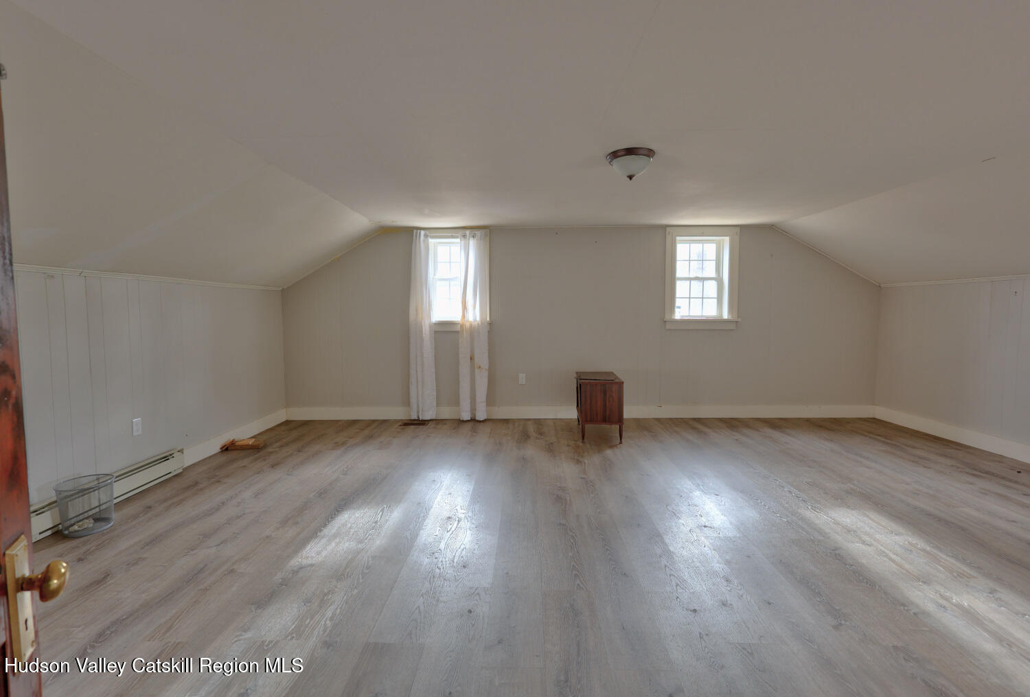 7548 Highway 32 Cairo, NY 12413 - Photo 33 of 50 an empty room with wooden floor and windows