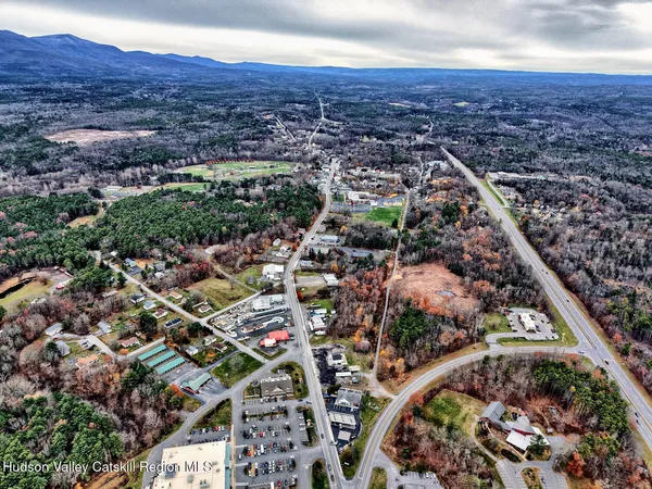 an aerial view of a house and a yard