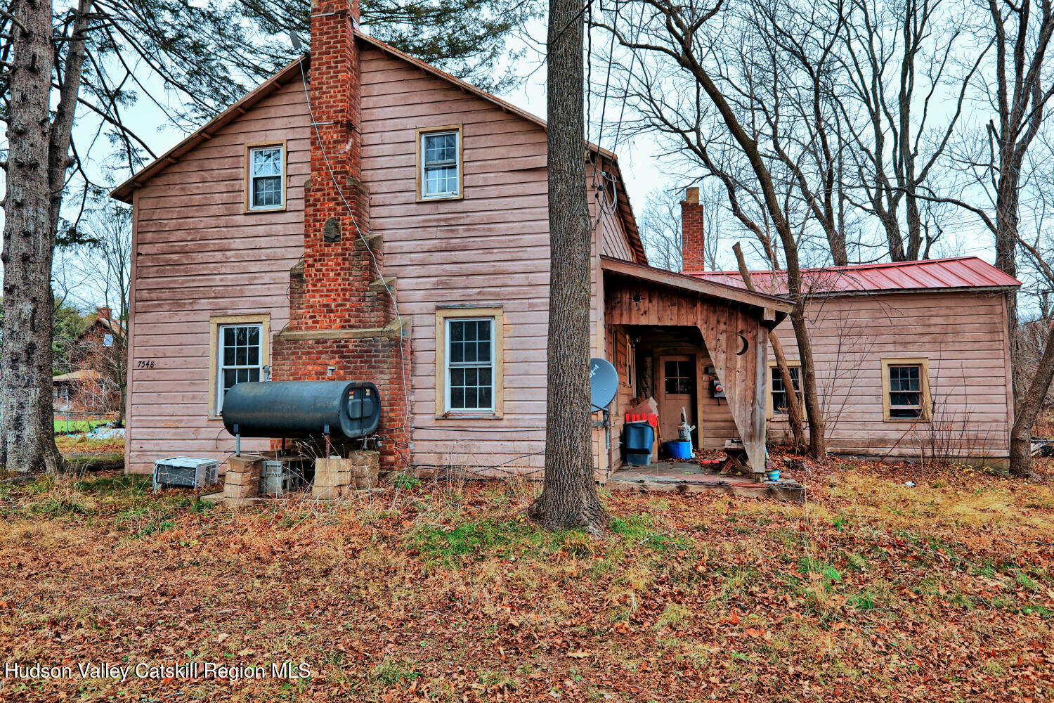 7548 Highway 32 Cairo, NY 12413 - Photo 8 of 50 a view of a house with backyard and chairs