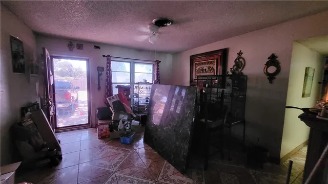 a room with a closet and a flat screen tv