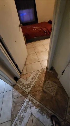 a view of a backyard with swimming pool