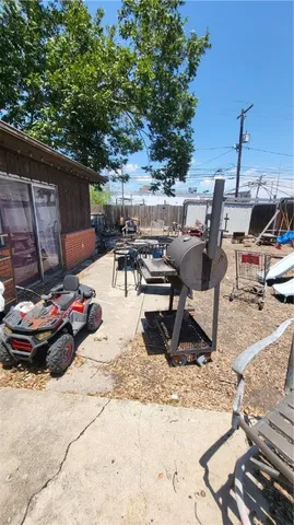 a view of a parking area with lots of swings