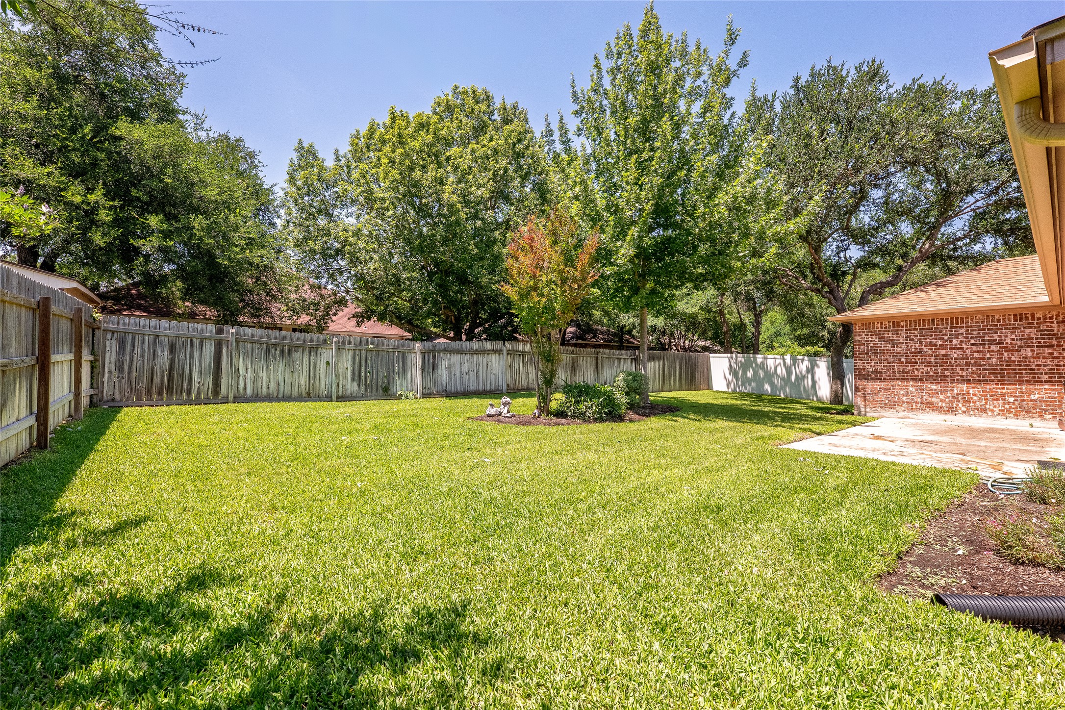 111 Arrowhead Lane Georgetown, TX 78628 - Photo 39 of 40 a view of a backyard with swimming pool