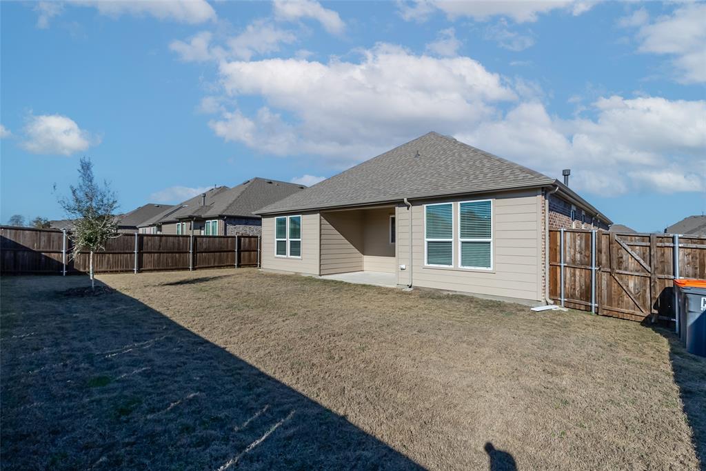 1260 Sharp Street Anna, TX 75409 - Photo 32 of 35 Large backyard with covered patio