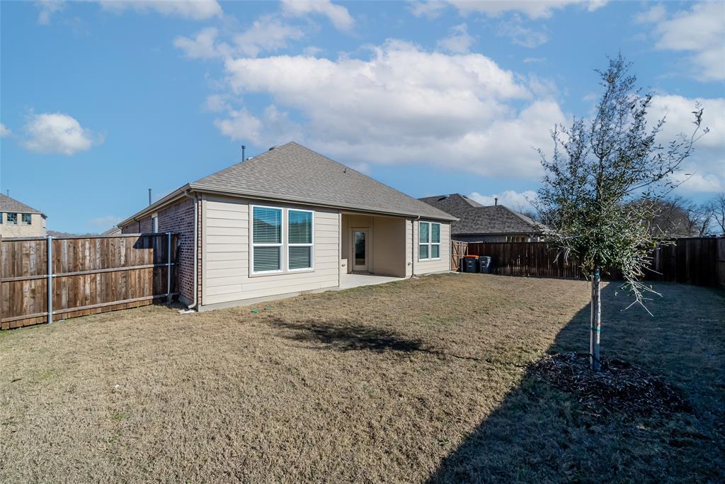 1260 Sharp Street Anna, TX 75409 - Photo 5 of 35 Large backyard with covered patio