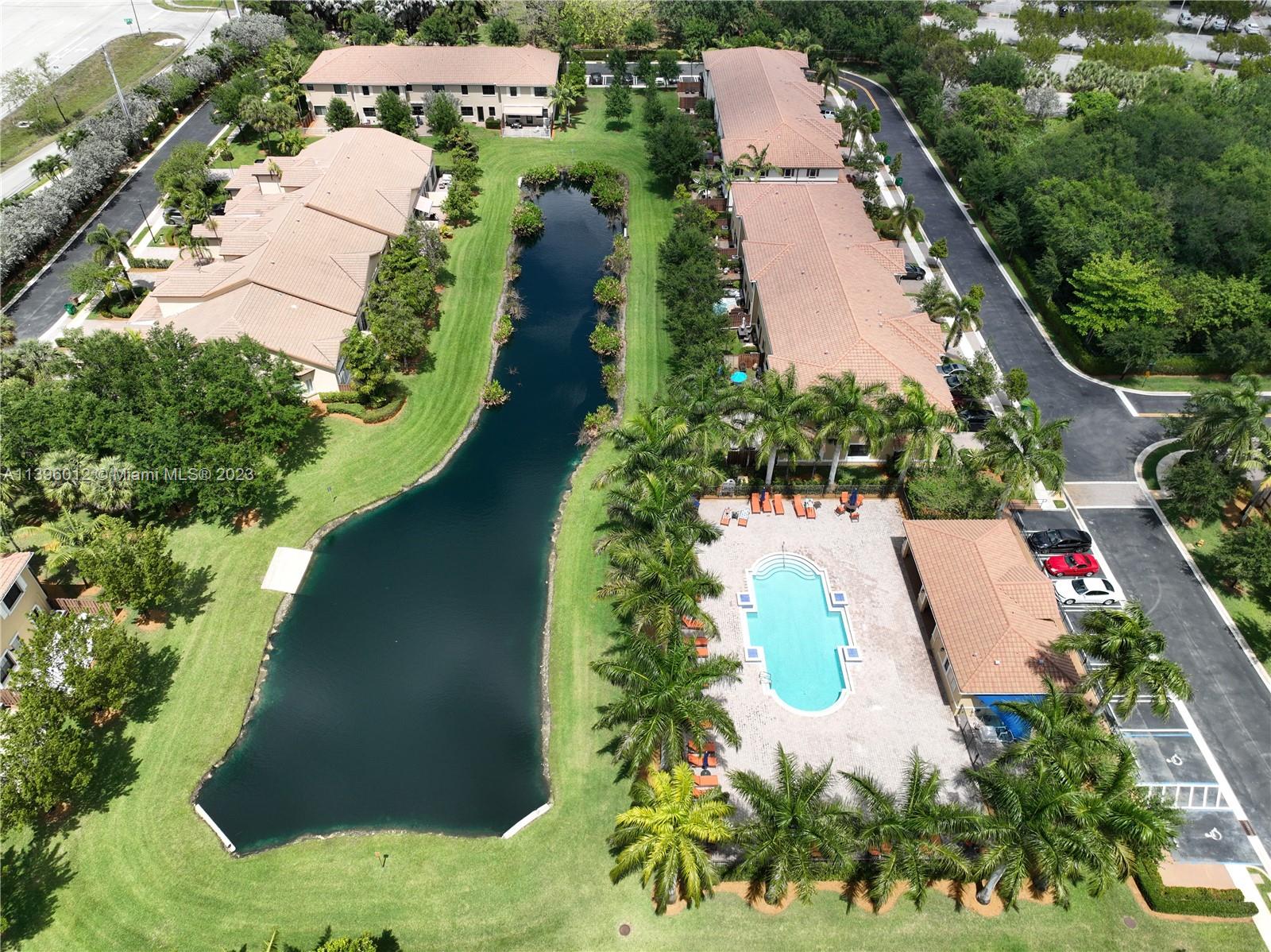 12120 Village Place Davie, FL 33325 - Photo 33 of 35 an aerial view of residential houses with outdoor space