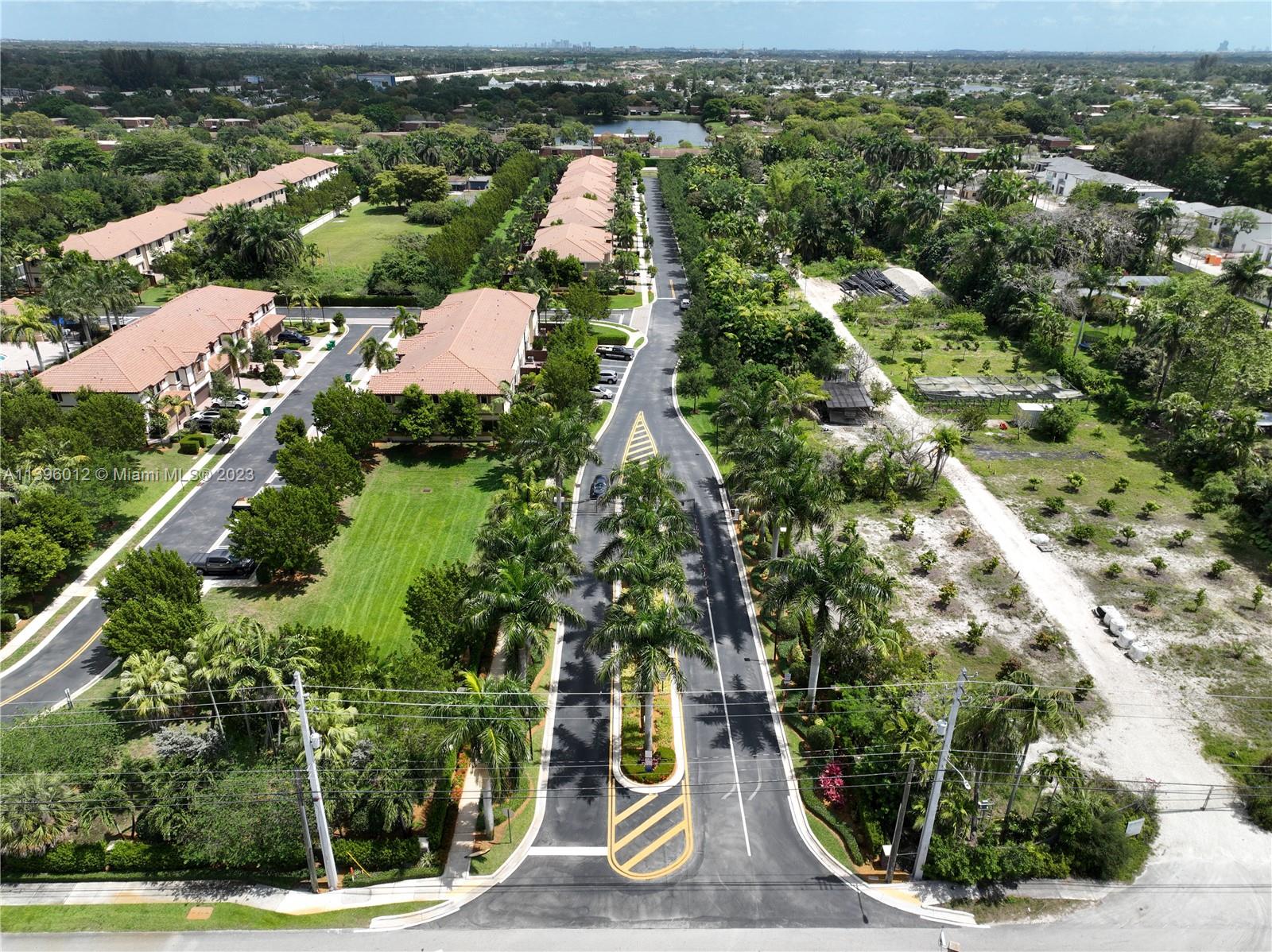 12120 Village Place Davie, FL 33325 - Photo 34 of 35 an aerial view of residential houses with outdoor space