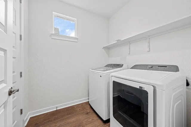 a utility room with dryer and washer