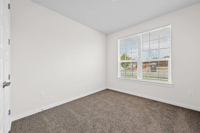 an empty room with a window