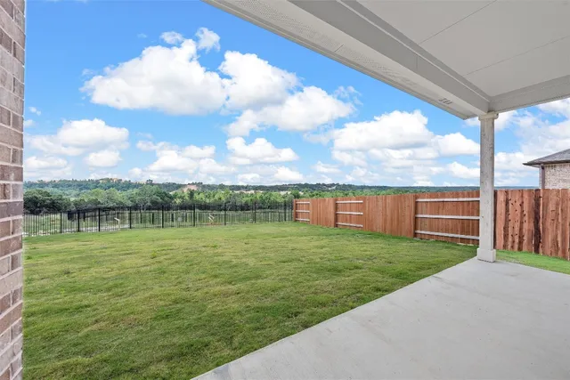 a view of a golf course with a lake