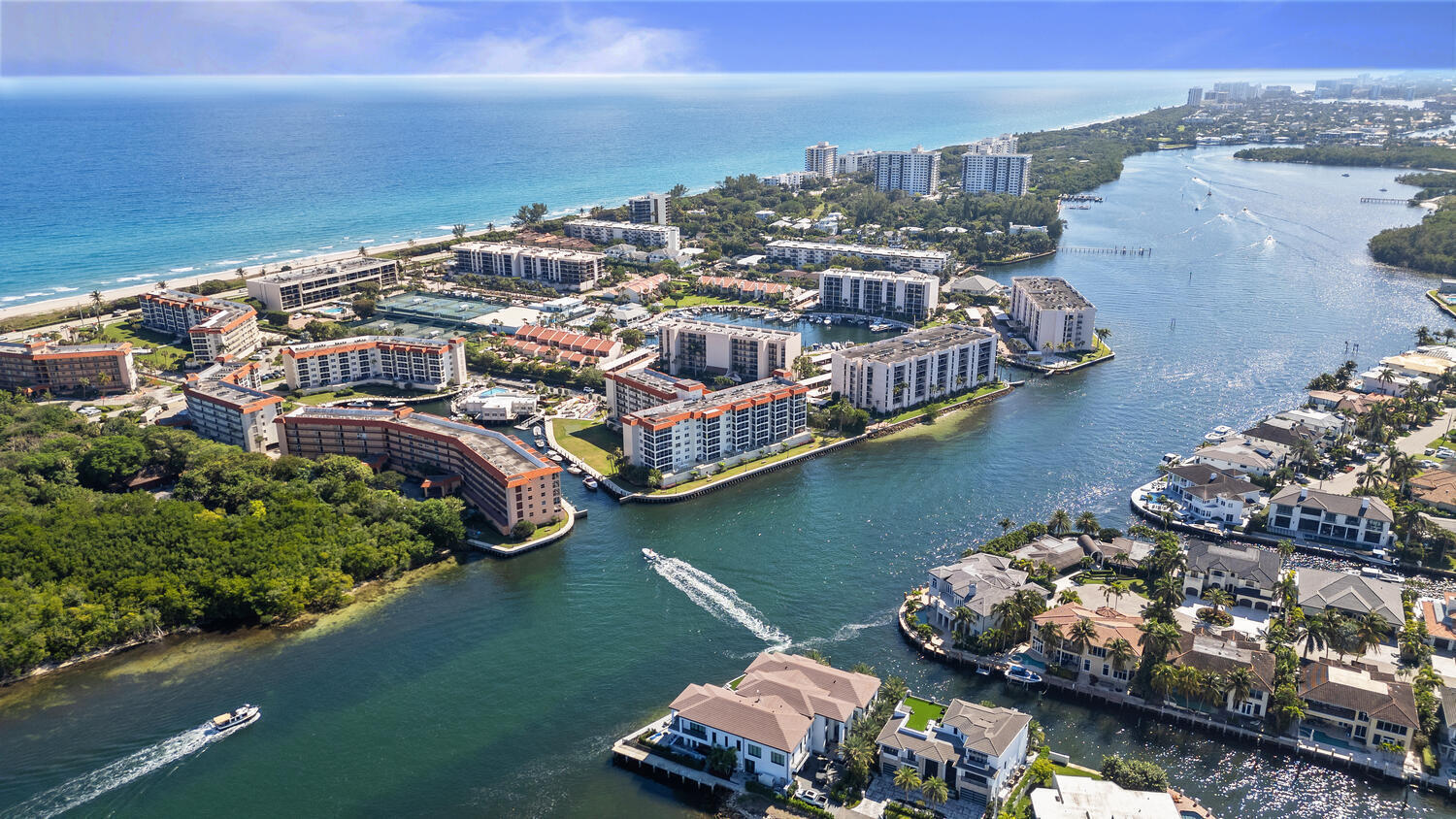 2871 North Ocean Boulevard, Unit V443 Boca Raton, FL 33431 - Photo 42 of 49 an aerial view of residential houses with outdoor space