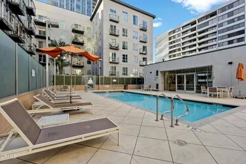 a outdoor space with lots of white furniture