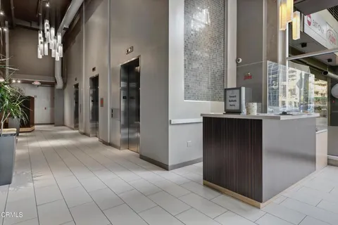 a view of a bathroom with a bathtub and shower