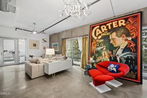 a bed room with a bed and a couch