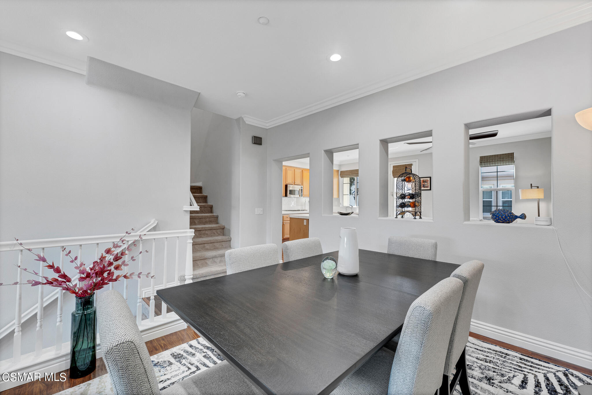 1233 Bayside Circle Oxnard, CA 93035 - Photo 12 of 37 a view of a dining room with furniture and wooden floor