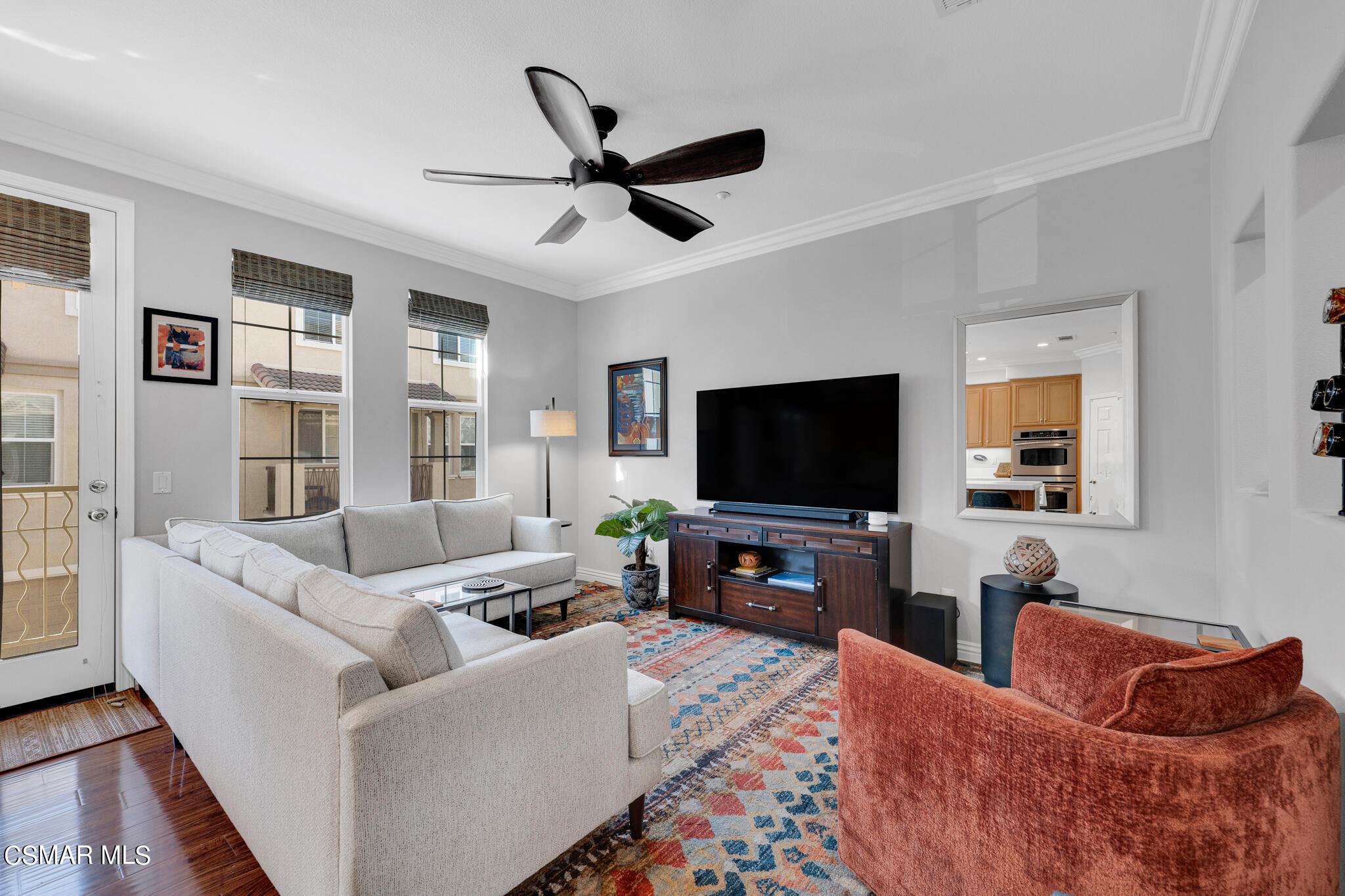 1233 Bayside Circle Oxnard, CA 93035 - Photo 13 of 37 a living room with furniture and a flat screen tv
