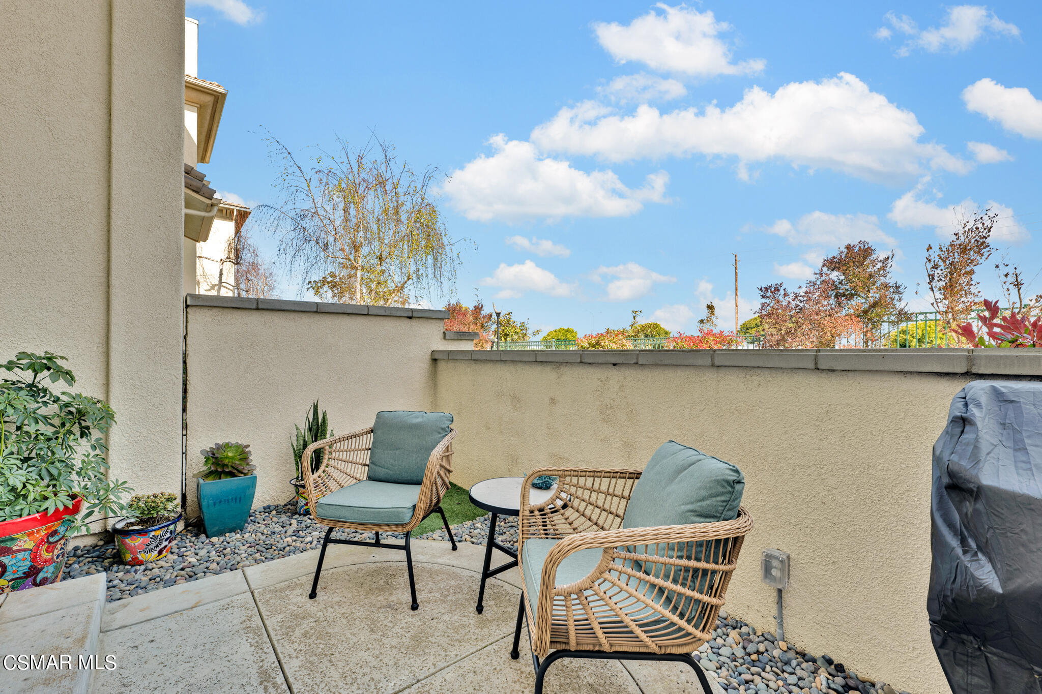 1233 Bayside Circle Oxnard, CA 93035 - Photo 6 of 37 a view of a chairs and table in a terrace