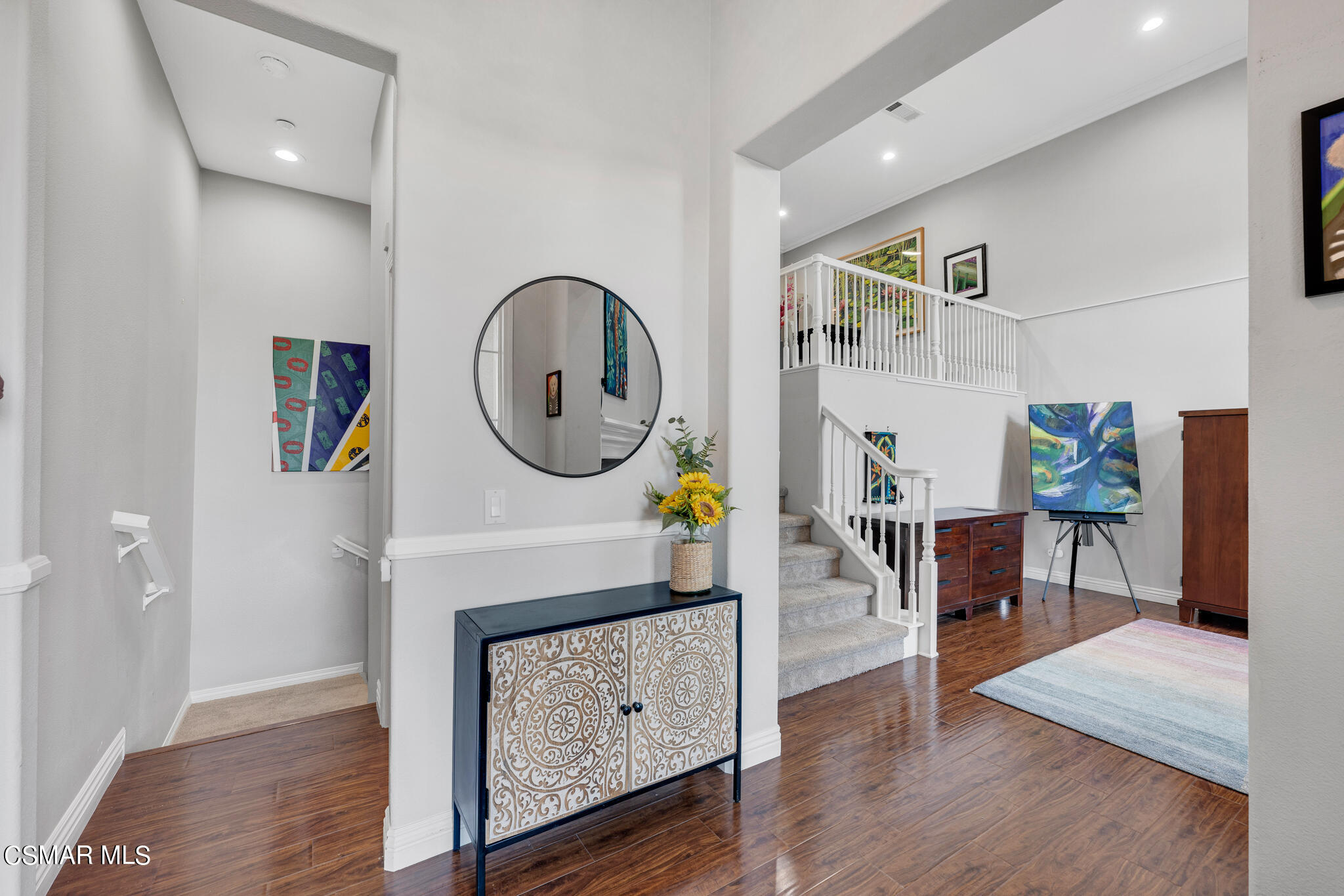 1233 Bayside Circle Oxnard, CA 93035 - Photo 8 of 37 a living room with furniture and a wooden floor