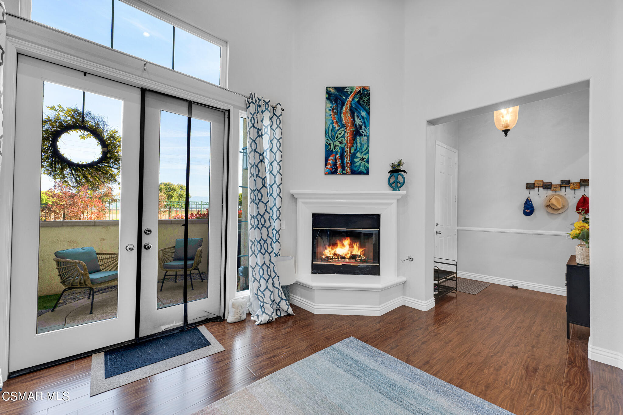 1233 Bayside Circle Oxnard, CA 93035 - Photo 10 of 37 a living room with furniture and a fireplace